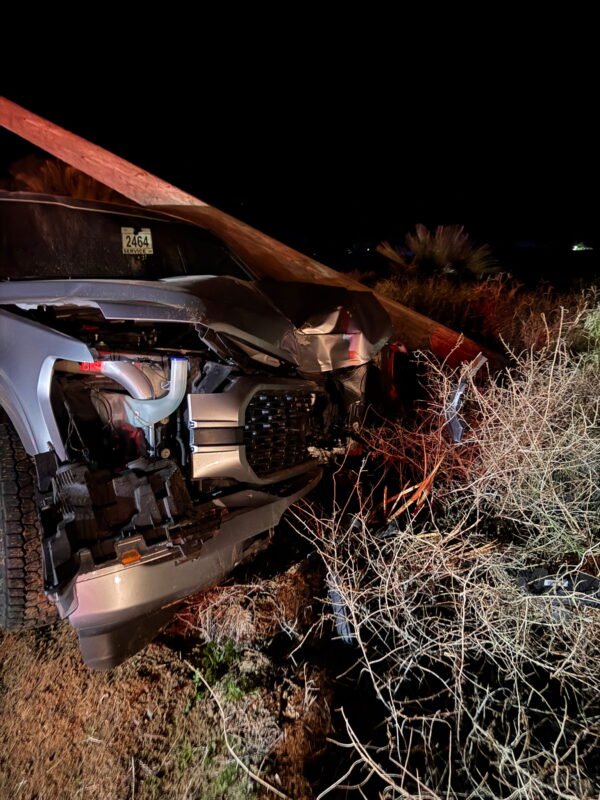 close up of vehicle collision with power pole