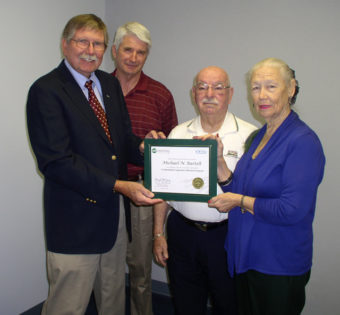 Board member Michael Bartelt getting his accredited Credentialed Cooperative Director Certificate