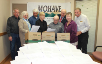 Board members with boxes of letters