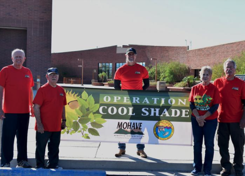 Group with Operation CoolShade banner