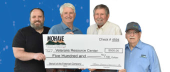 Veterans Resource Center receiving check from MEC