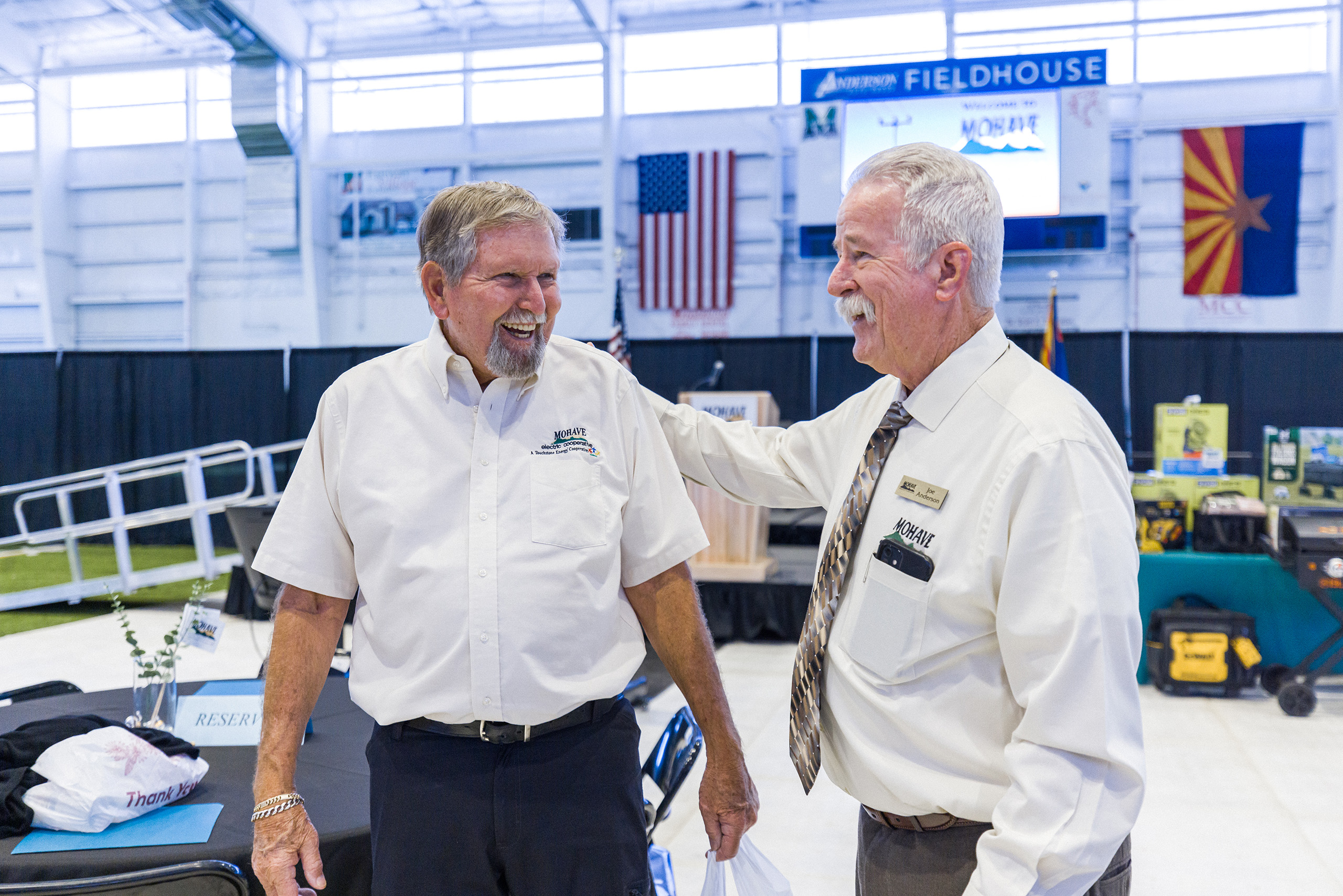 MEC team members conversing at the Annual Meeting